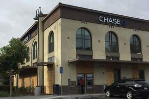 TAKE DOWN THE PLYWOOD, OAKLAND SAYS article image
